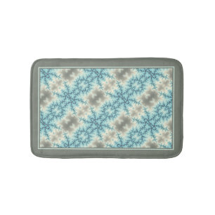 Abstract blue, grey snowflake pattern with border bath mat