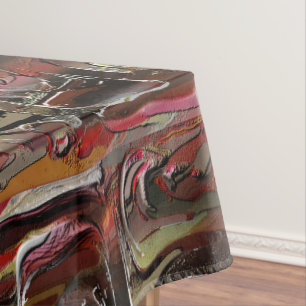 Abstract carved in mahogany and dark red tablecloth