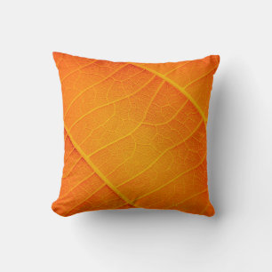 Abstract closeup of an orange and yellow leaf text throw pillow