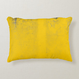 Abstract colourful yellow cement wall texture and accent pillow