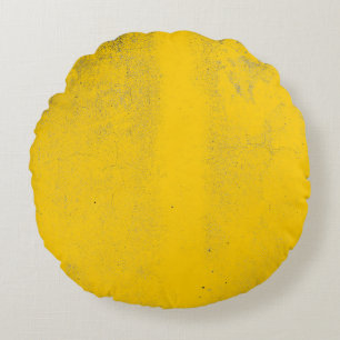 Abstract colourful yellow cement wall texture and round pillow