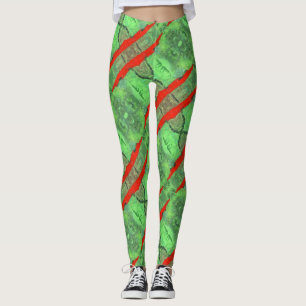 Abstract design, tiled green with red spirals leggings