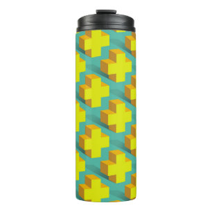 Abstract geometric texture of yellow crosses on a thermal tumbler