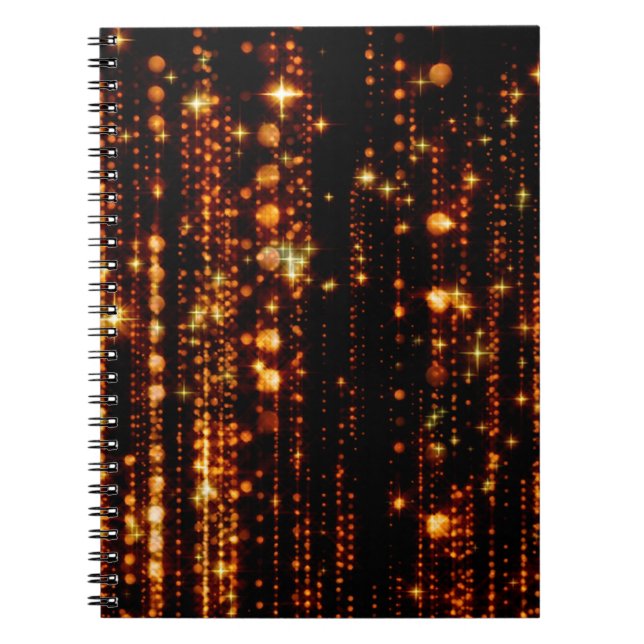 Abstract gold rain with bright particles with flar notebook (Front)