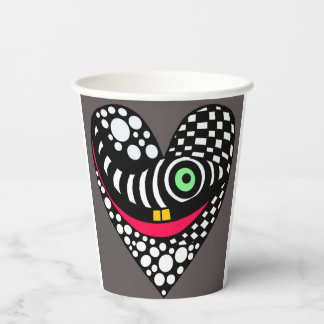 Abstract heart on grey paper cups