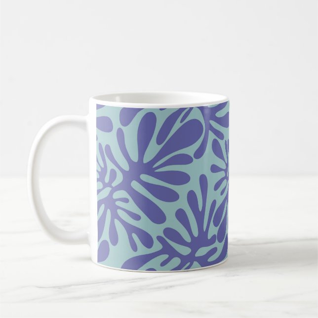 Abstract modern pattern: purple shapes on blue coffee mug (Left)