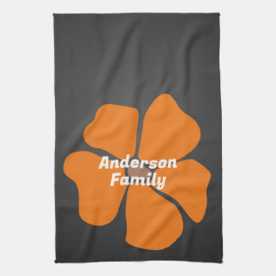 Abstract Orange Daisy Flower on Dark Kitchen Towel
