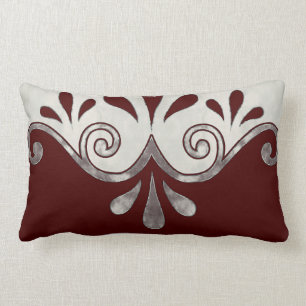 Abstract ornamental shape in burgundy and silver lumbar pillow