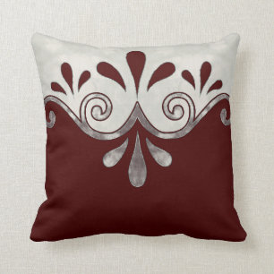 Abstract ornamental shape in burgundy and silver throw pillow