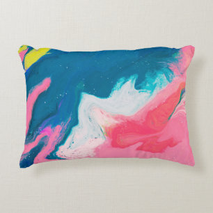 Abstract pink and turquoise paint background with accent pillow