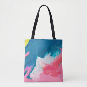 Abstract pink and turquoise paint background with tote bag