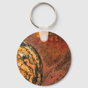 Abstract planet in red and orange keychain