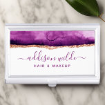 Abstract Purple And Gold Watercolor Business Card Holder<br><div class="desc">Stand out from the crowd with our abstract purple and gold watercolor business card case. The stunning watercolor design features a mix of deep purples and rich golds that create a sophisticated and elegant look, perfect for any business professional. Customize your design with your own personal information, choosing from a...</div>