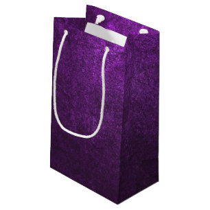 Abstract Purple Background Or Paper With Bright Small Gift Bag