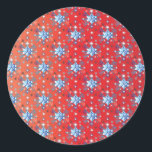Abstract red and blue Christmas snowflakes Classic Round Sticker<br><div class="desc">Abstract blue and white Christmas snowflakes pattern on a red background. Need more? Check out other holiday designs at my store! Cheers! :)</div>