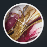 Abstract Sparkling Wine Red ID1018 Clock<br><div class="desc">This flowing,  alcohol ink abstract design sets the perfect tone for a modern apartment or home office. In shades from white to deep wine red,  accented with glittering gold,  the wall clock design is shown here framed in white. Search ID1018 to see other products with this eye-catching design.</div>