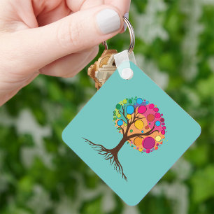 Abstract tree with roots and colourful leaves. keychain
