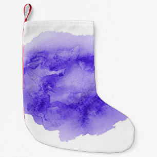 Abstract watercolor background image with a liquid small christmas stocking