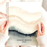 Abstract Watercolor Waves 2025 Custom Name Planner<br><div class="desc">Dive into a sea of tranquillity with this calming planner. Abstract watercolor waves in soothing shades of blue, grey, and beige create a serene backdrop for your dreams and aspirations. Imagine yourself jotting down your thoughts and appointments amidst this tranquil flow. Personalize it with your name and let this planner...</div>