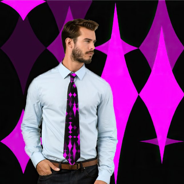 Abstracted Fuchsia Diamonds On Black Tie (Man wears a necktie featuring an abstract fuchsia diamond pattern on black. Background matches tie.)