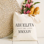 Abuelita Roman Numeral Year Established Tote Bag<br><div class="desc">A modern minimalist tote bag to celebrate a chic grandma,  this clean minimal tote features "Abuelita" or your choice of grandma nickname in black serif lettering. Customize with the year she became a grandmother beneath in elegant roman numerals for a chic touch.</div>