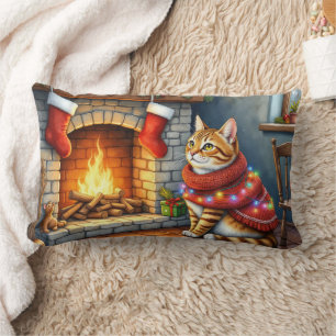 Abyssinian Cat Sitting by Fireplace with Christmas Lumbar Pillow