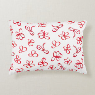 Accent pillow with red flowers