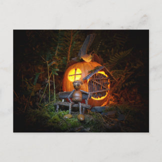 Acorn elf is sitting in front of pumpkin house postcard