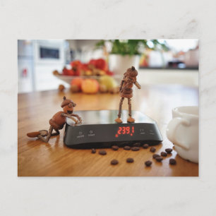 Acorn elf teasing his girl with the weight postcard