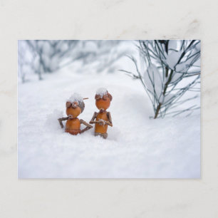 Acorn elves on a snow - winter postcard