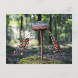 Acorn elves playing on the carousel postcard