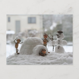 Acorn elves playing with the snow winter postcard
