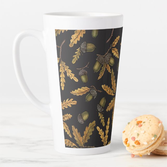 Acorns and oak leaves on black latte mug (In Situ)