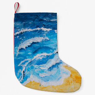 Acrylic sea and beach painting on drawing stand wi small christmas stocking