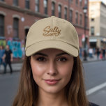 Acting Salty Funny Sarcasm Saying Embroidered Hat<br><div class="desc">Add a bold dose of attitude to your everyday style with this Salty Funny Sarcasm Saying design by Ricaso. Featuring clean embroidered lettering and a confident, tongue-in-cheek message, it’s perfect for anyone who appreciates dry humor, witty comebacks, and a little playful sass. Simple text-based designs let the humor do the...</div>