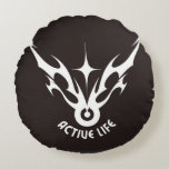 Active Life – Tribal Wings Star Emblem Round Pillow<br><div class="desc">This bold black-and-white emblem features a stylized tribal design resembling wings or flames rising from a circular base with a star-like figure at its centre. Beneath the design, the phrase “ACTIVE LIFE” is displayed in bold, curved capital letters. The strong contrast against the black background emphasizes energy, vitality, and dynamic...</div>