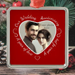 Add a Photo to Romantic Heart Cutout Metal Ornament<br><div class="desc">How romantic! Add your own photo to the heart-shape cutout within the square frame of this ornament. The red frame has white script text that says 'Our Wedding Anniversary' across the top, and 'A year of love', 'A year of joy' along each side. Pretty scrolls and a love heart complete...</div>
