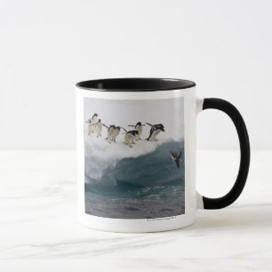 Adelie Penguins diving into sea Paulette Mug