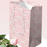 Adorable Bow Pink White Pattern Medium Gift Bag<br><div class="desc">A simple and stylish gift bag, with a pretty ribbon bow pattern in a colour palette of blush pink and white. A perfect addition to your gift wrap for all types of celebration, including birthdays, baby showers, Mother's Day, weddings and more! Blush pink and white colour palette, available with a...</div>