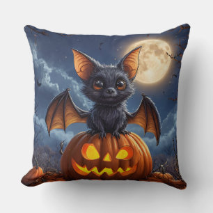 Adorable Cartoon Bat Perched on Jack-o'-Lantern Throw Pillow