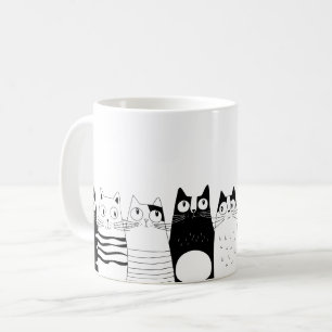 Adorable cat sitting coffee mug