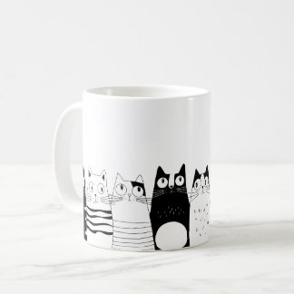 Adorable cat sitting coffee mug
