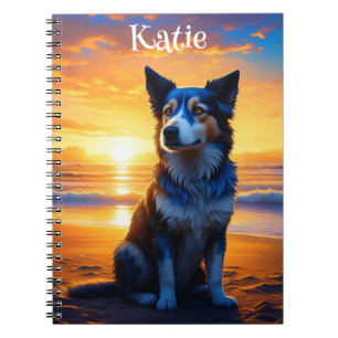 Adorable Dog sitting on the Ocean Beach at Sunset Notebook