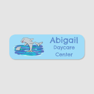 Adorable happy dolphins cartoon illustration name tag