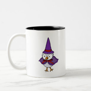 Adorable little bird wearing a wizard costume Two-Tone coffee mug