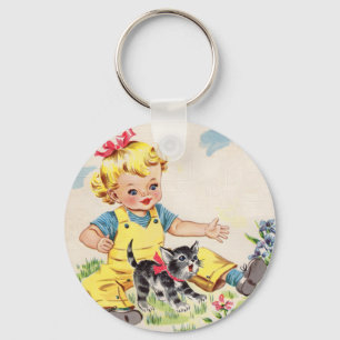 adorable little girl with adorable little kitten keychain