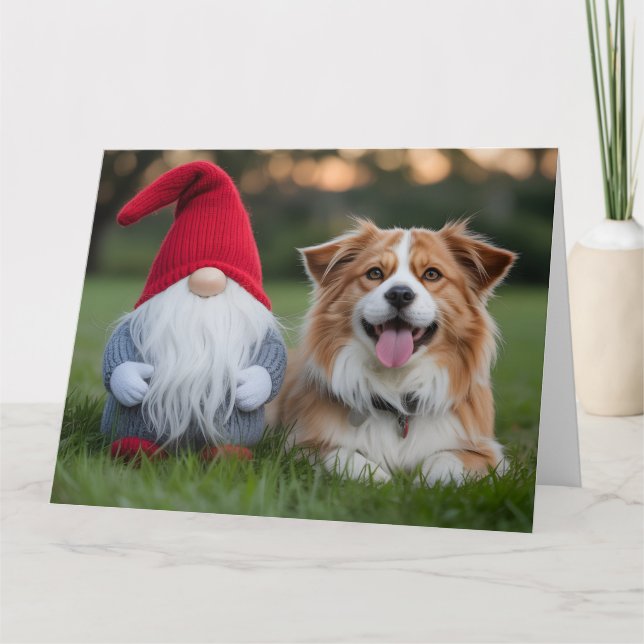 Adorable Plush Gnome and Fluffy Dog Lying in Grass Card