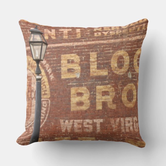Advertisements on side of building throw pillow (Front)