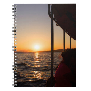 Aegean lifestyle on boat at sunset in summer notebook