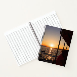 Aegean lifestyle on boat at sunset in summer notebook
